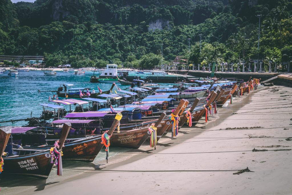 long-tail-boats-parked-on-the-beach-Koh-Phi-Phi-don-thailand-tonsai-bay